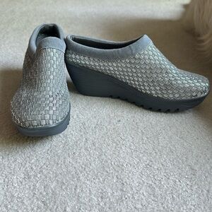 Silver checker pattern shoes never worn